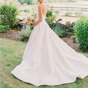 Anne Barge,  Elegant White Strapless Wedding Dress Conferri